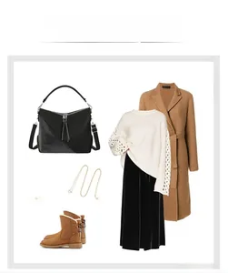 Fashionable black tote bag paired with brown wool coat and velvet skirt for winter outfit