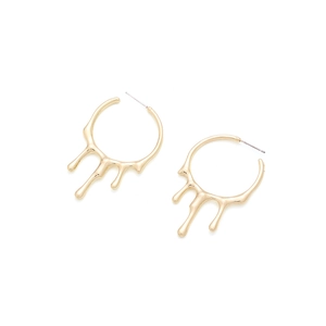 Detail of liquid gold alloy hoop earrings with unique melting lava drop design
