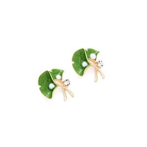 Close-up of green enamel ginkgo leaf earrings with white pearls and sparkling crystals