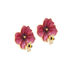 Vintage enamel earrings featuring dark rose flowers and detailed honeybee accents