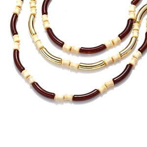Bohemian multi-layer necklace with gold metal tubes and dark brown resin beads