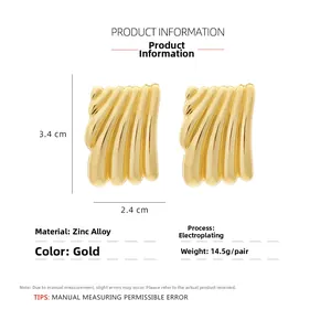 Detailed size view of gold plated geometric earrings with wavy texture and rectangle shape