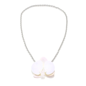 Elegant white orchid flower pendant on silver link chain with minimalist vacation style