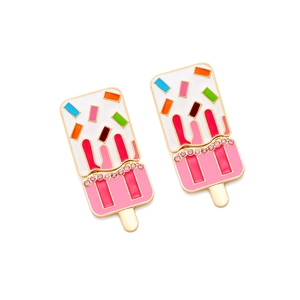 Detail of sweet enamel ice cream earrings with colorful sprinkles and pink rhinestones