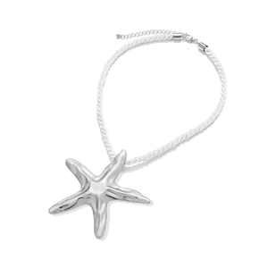 Detailed view of silver starfish pendant necklace with white twisted rope and lobster clasp