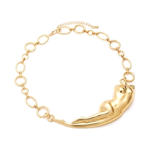 Artistic gold human torso pendant necklace with bold oval link chain on white background