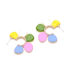 Macro detail of colorful enamel flower earrings with intricate pearl bead centers
