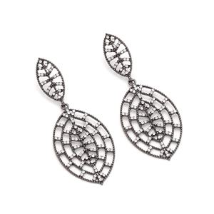 Detailed macro view of gunmetal alloy hollow leaf earrings with micro-inlaid rhinestones