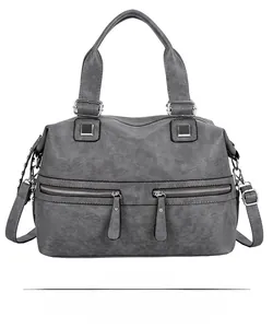 Front view of grey large capacity soft leather tote bag with silver zipper details