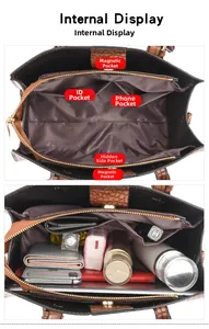Internal view of brown faux crocodile handbag showing multi-pocket storage space