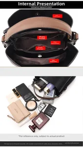 Detailed view of spacious black leather bucket bag with multiple inner compartments