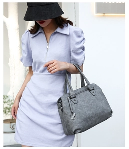 Grey large capacity fashion tote bag with dual handles and metal zipper detail