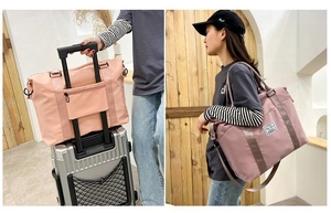 Detail of pink duffel bag with luggage sleeve and model showing large storage capacity