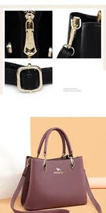 Detailed close-up of premium gold-tone hardware and stitching on purple leather handbag