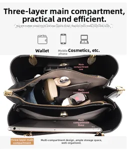 Three-layer interior structure of black handbag showing large capacity storage compartments