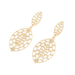 Close-up of golden hollow leaf earrings with sparkling white rhinestone embellishments