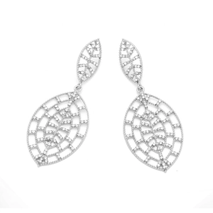 Detailed view of silver hollow leaf earrings featuring intricate pavé diamond settings