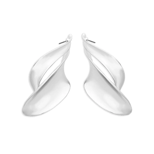Macro shot of silver twisted leaf earrings with a sculptural metallic texture