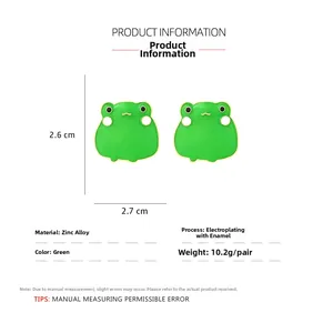 Detail view of cute green enamel frog earrings with dimensions of 2.6cm by 2.7cm