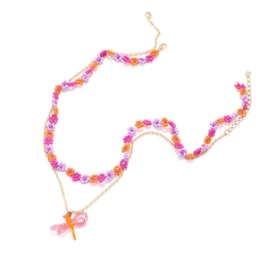 Bohemian beaded layered necklace with floral motifs and dragonfly pendant charm