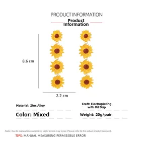 Detailed view of layered sunflower earrings with yellow enamel and 8.6cm length spec