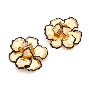 Chic gold enamel flower stud earrings with black trim in a minimalist floral design