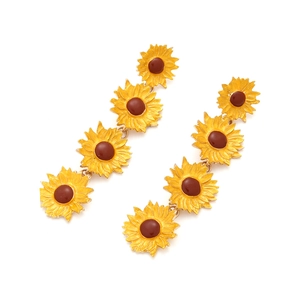 Fashionable long sunflower drop earrings with yellow enamel petals and brown center