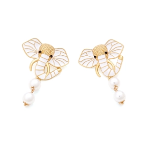 Detail view of gold elephant earrings with white enamel finish and white pearl drops