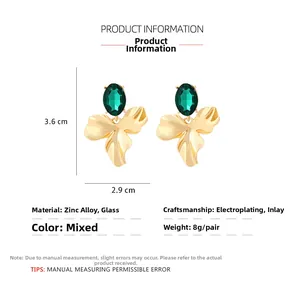 Detailed view of green crystal flower earrings with 3.6cm x 2.9cm size dimensions