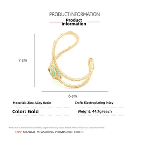 Detailed size chart for a gold-tone open cuff bracelet with green resin stone inlay