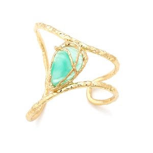 Artistic gold open cuff bracelet with hammered texture and green teardrop gemstone