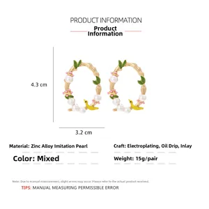 Detailed product dimensions for enamel bird and flower wreath stud earrings