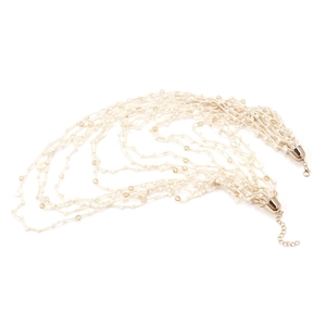 Collana multistrato bohémien con cordini intrecciati avorio e chiusura dorata regolabile