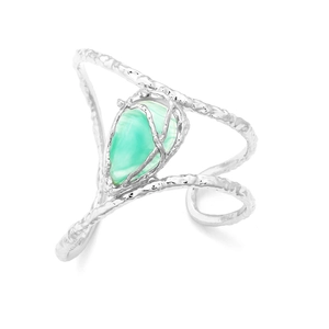Silver open bangle featuring a teardrop green stone with organic textured metal band
