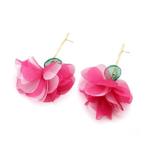 Detail view of pink chiffon flower earrings with green leaves and gold hooks