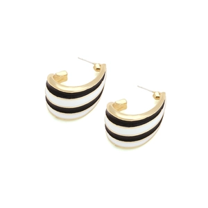 Retro C-shaped gold hoop earrings with black and white enamel stripes for women