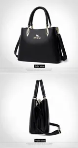 Detail of black pebbled leather handbag with golden kangaroo logo and adjustable strap
