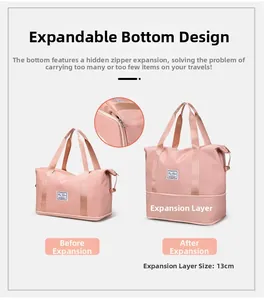 Pink oxford travel bag detail showing the bottom 13cm expandable zipper layer design