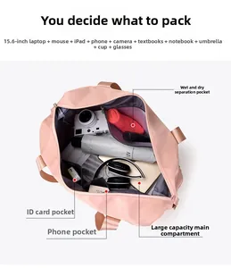 Detail view of pink gym bag interior with dry-wet separation and laptop storage pockets