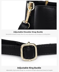Detail of gold hardware hooks and adjustable buckle on black lychee leather bag