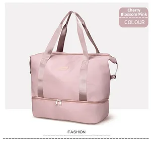 Close-up of pink travel bag showing the bottom shoe compartment and waterproof fabric