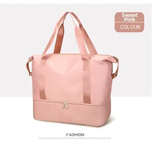 Detail view of pink travel bag showing the double-layer waterproof fabric and bottom zipper