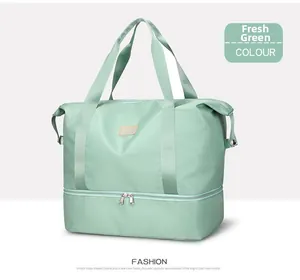 Detail of mint green travel bag featuring a separate wet dry bottom compartment
