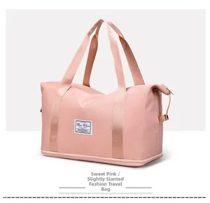 Detail of pink oxford travel bag with sturdy handles and metal zipper closure