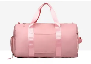 Pink waterproof travel bag back view showing convenient luggage trolley handle sleeve