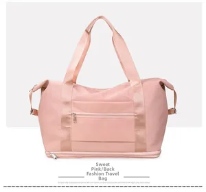 Rear view of pink Oxford fabric travel bag with external zipper pocket and bottom compartment