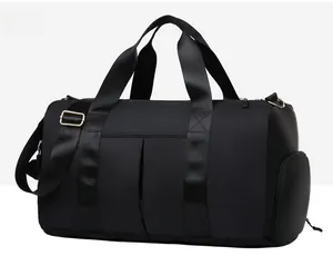 Large capacity black sports bag with separate side compartment and waterproof nylon fabric