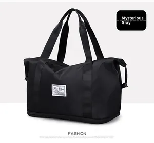 Detail view of the expandable bottom layer on the mystic grey travel bag in oxford fabric