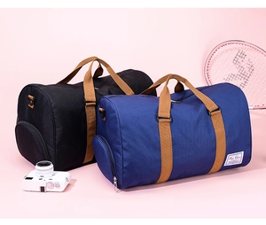 Macro view of waterproof nylon travel bag with durable brown handles and side shoe pocket