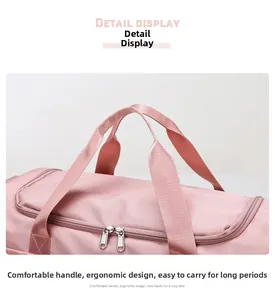 Dettaglio borsa fitness rosa con manici larghi e doppia cerniera in metallo su nylon